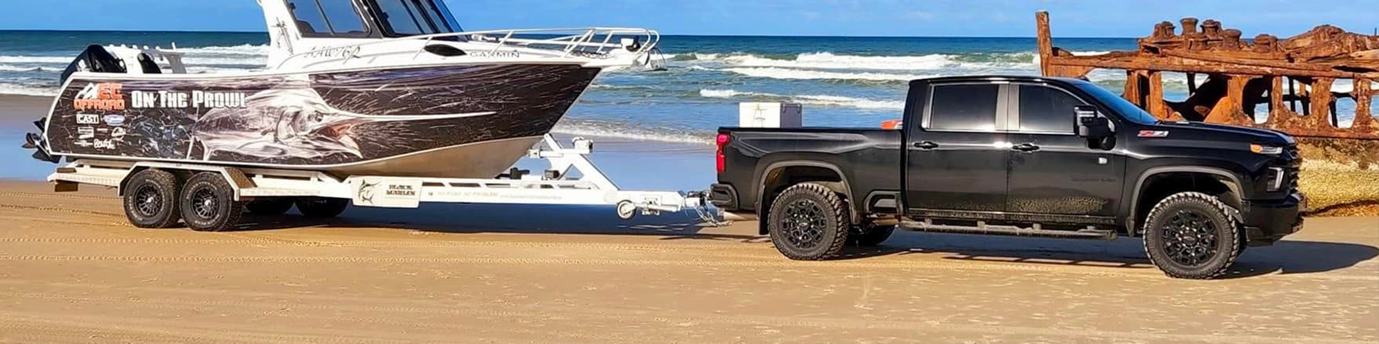 Gen-Y Hitch - Towing Boat on the Beach